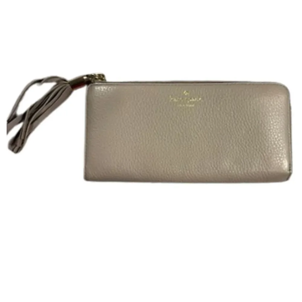 Kate Spade New York Pebbled Leather Zip Around Wallet Taupe Greige Tassel